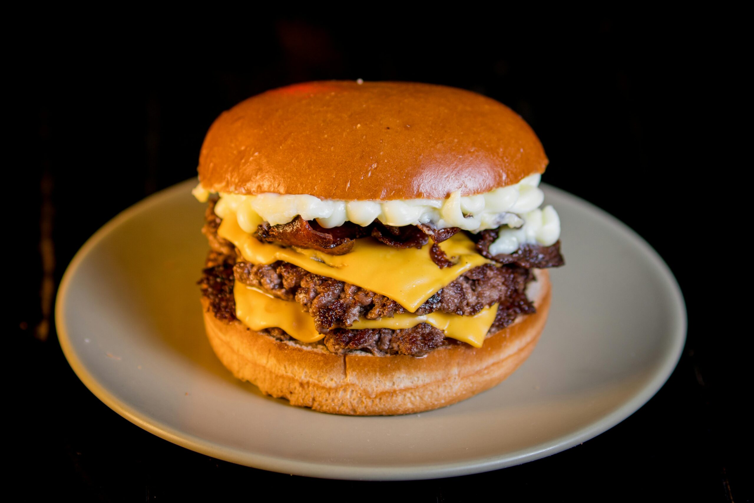 Mouth-watering double cheeseburger with juicy beef, melted cheese, and bacon.